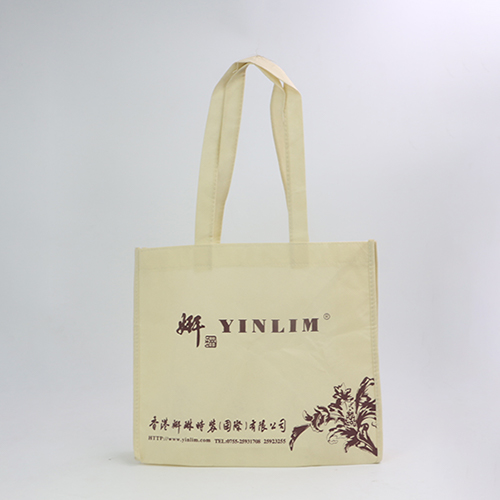 米色無(wú)紡布手提服裝宣傳袋定做